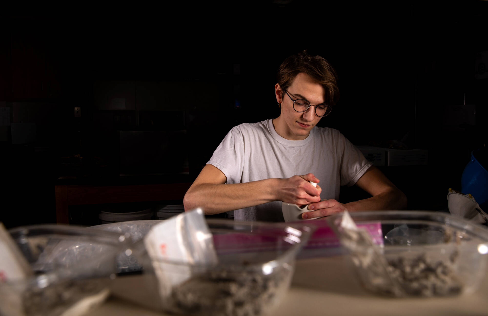 GVSU student scholars student working on an anthropology project.